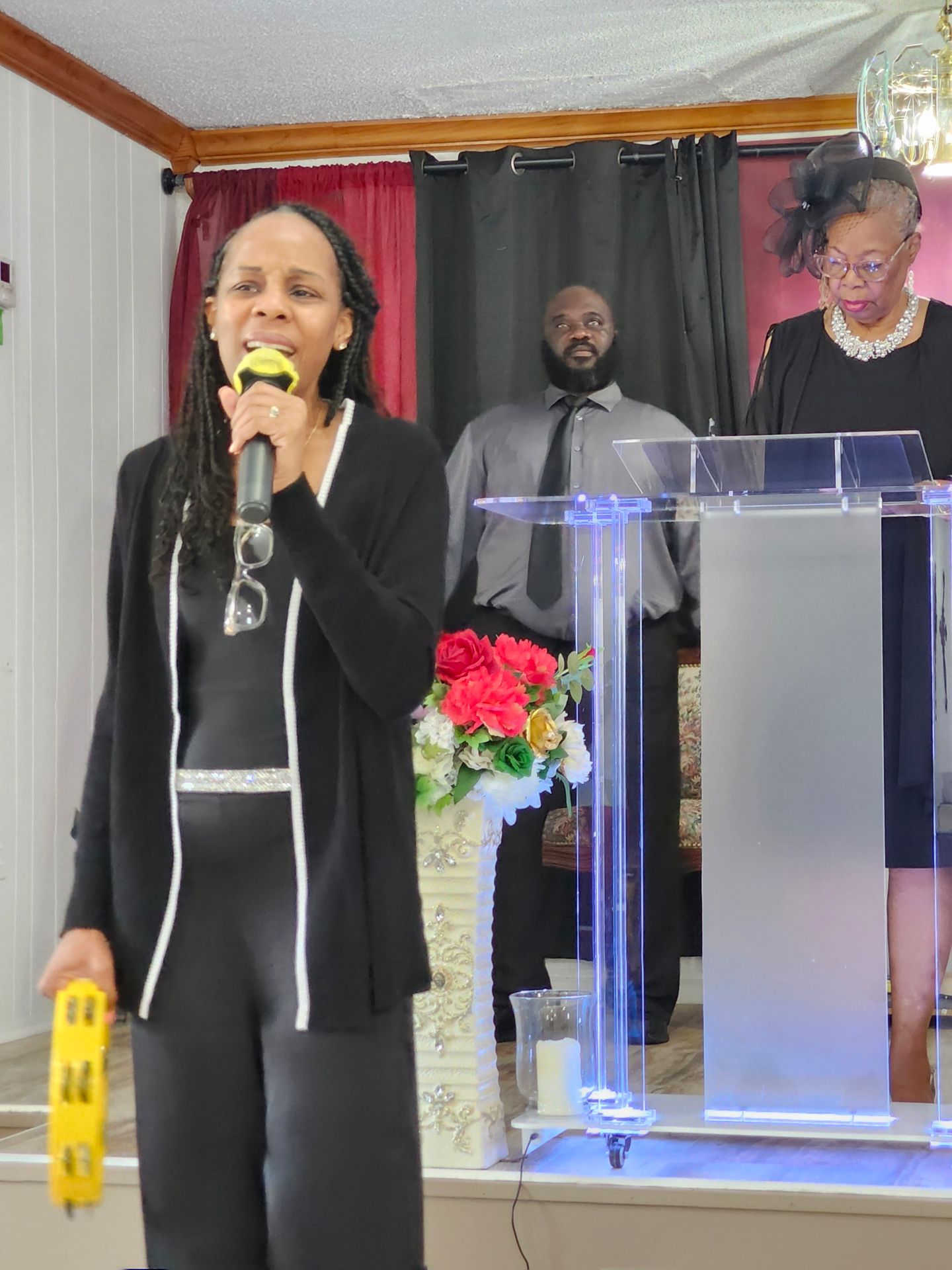 Worship leader singing during Sunday morning service